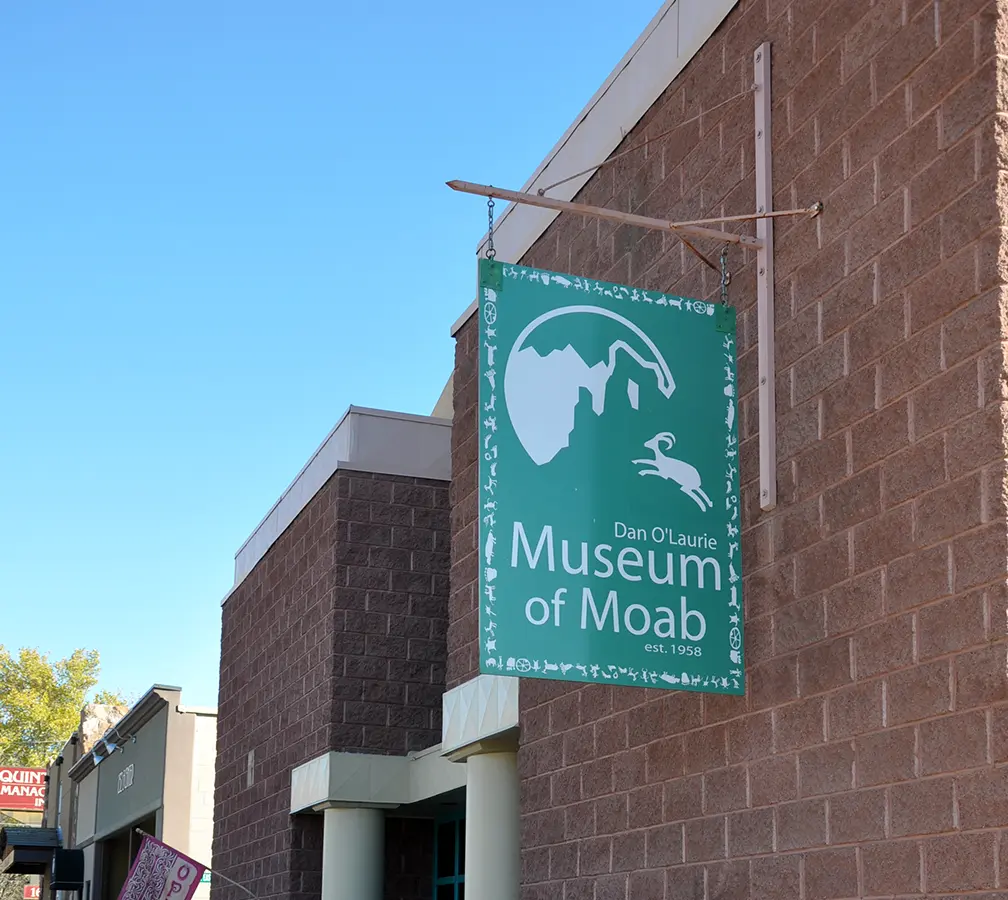Entrance of Moab Museum; the current exhibition and opening arrangement are separate checks.
