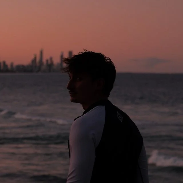 Nikita Zaytsev by the water at sunset