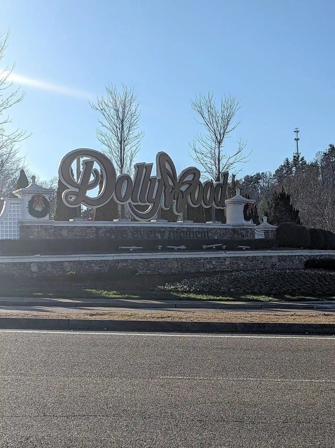Dollywood entrance in December 2023; archival seasonal decorations.